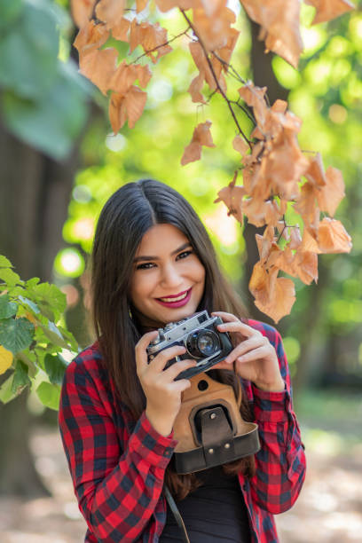 istock Woman Photographer in Nature 1129360381