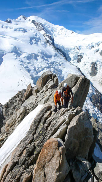 istock climbers in Chamonix with Mont Blanc in the background 1129361451