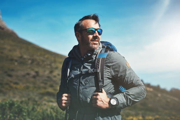 Shot of a middle aged man hiking in the mountains
