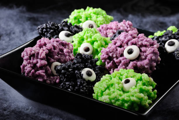 istock Monsters eye balls- made from marshmallows Rice Kris pies bites crispy bite balls. These are delicious, delight have a creepy monster and funny colors of Halloween 1129365577