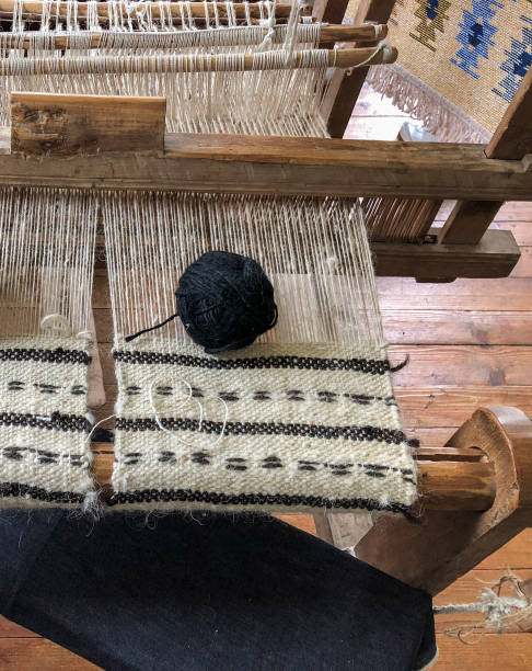 istock black skein on a manual carpet loom 1129365767