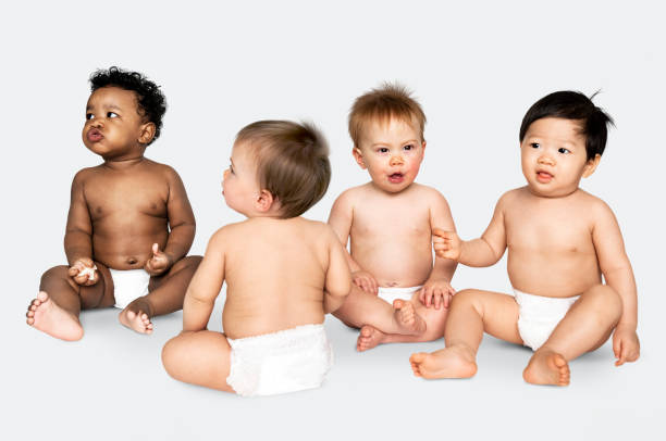 istock Studio shot of babies wearing diapers 1129366030