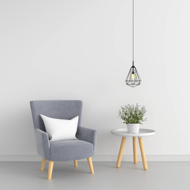 istock Gray sofa in white room for mockup, 3D rendering 1129368646