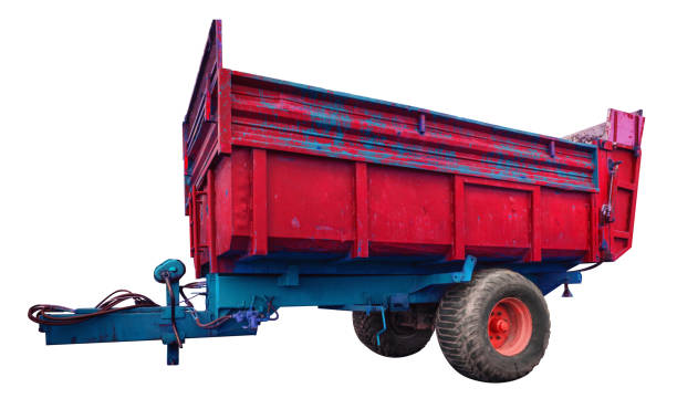 istock Farm trailer in red blue isolated on white 1129368890