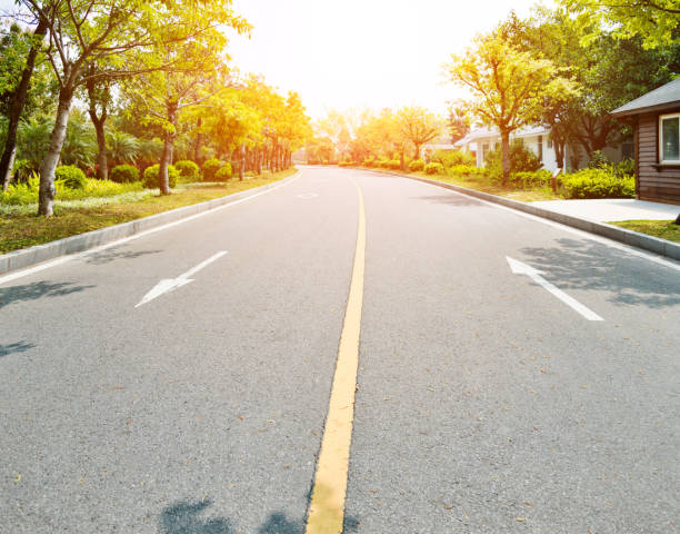 istock Asphalt highway with arrow sign 1129369483