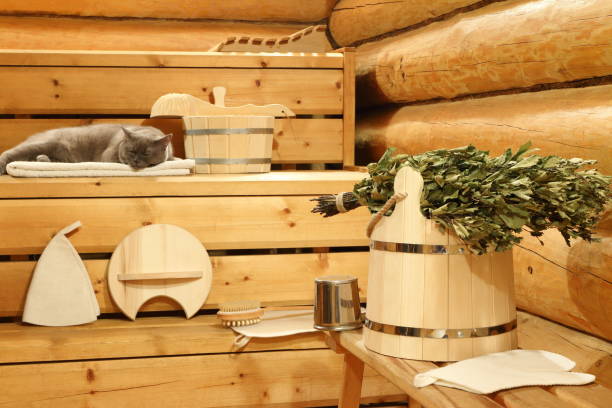 dry birch broom in the sauna. - wooden hub imagens e fotografias de stock