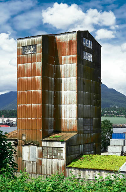 Sugar factory building in Vancouver, Canada Vancouver, B.C., Canada - June 19, 2012: One of Lantic Inc. Sugar Factory buildings located at Downtown East Side next to Vancouver Harbor east vancouver stock pictures, royalty-free photos & images