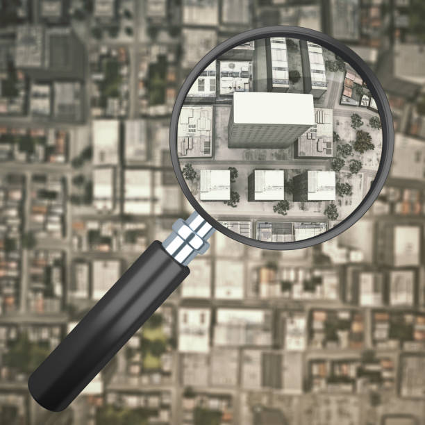 istock magnifier over city top view 1129375937