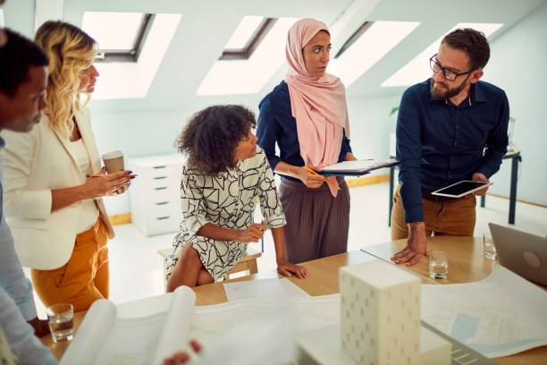 istock Diverse Business Team Brainstorming 1129382137