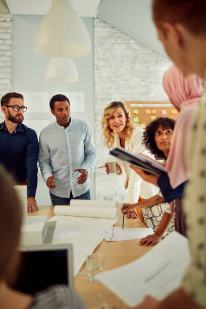 istock Diverse Business Team Brainstorming 1129382266
