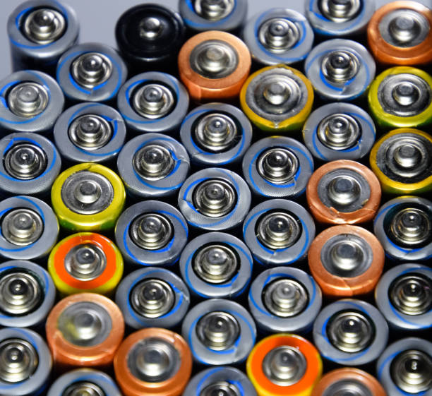 istock Salt and alkaline batteries, source of energy for portable technology. AAA and AA batteries 1129383054