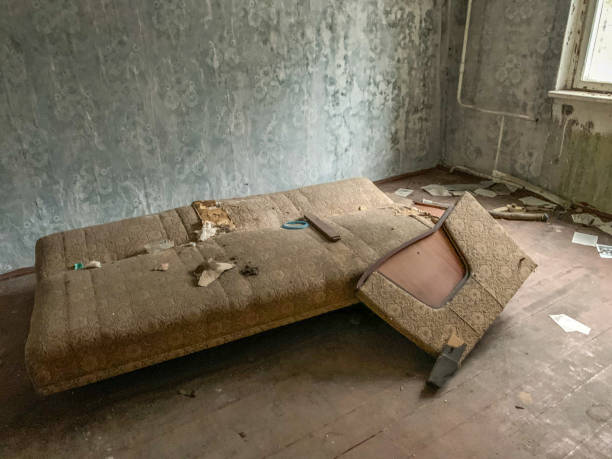 istock Abandoned apartment with derelict sofa bed - Pripyat 1129383074
