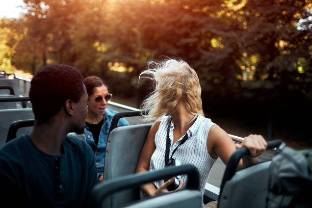 istock Open Top Bus Tour In The City 1129384666