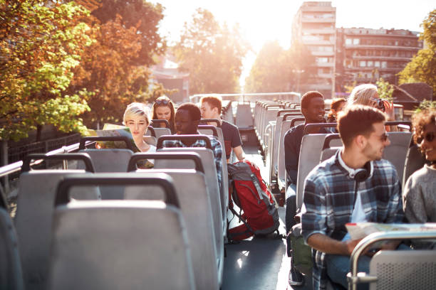 istock Open Top Bus Tour In The City 1129384778