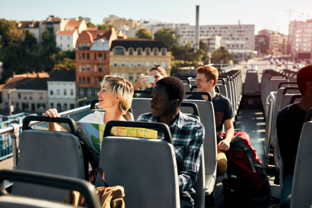 istock Open Top Bus Tour In The City 1129384830
