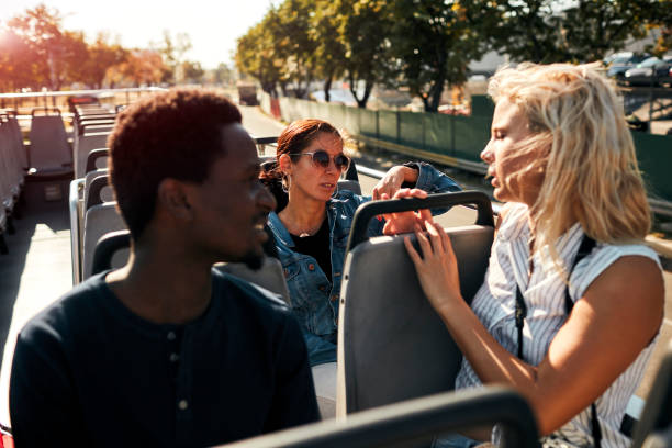 istock Open Top Bus Tour In The City 1129384925