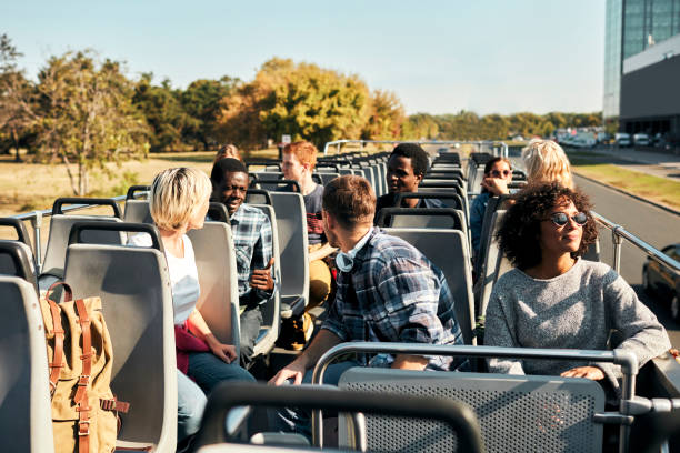 istock Open Top Bus Tour In The City 1129384935