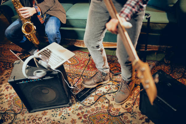 musicians having rehearsal in home studio. - wind instrument audio imagens e fotografias de stock