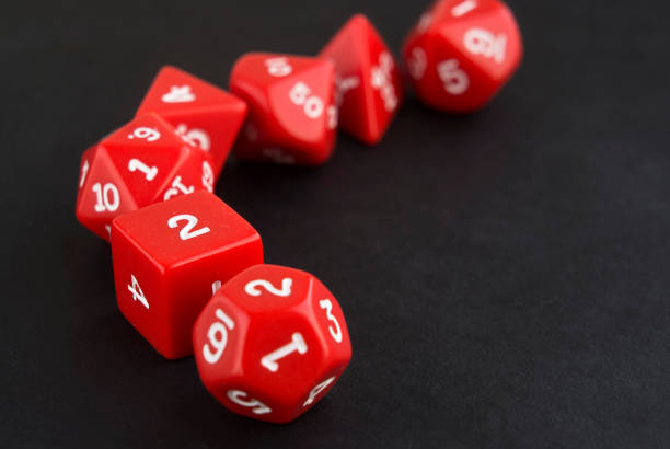 istock Set of red dices for board, tabletop or rpg games on black background. 1129388050