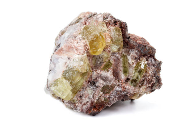istock Macro mineral stoneGolden Apatite on a white background 1129389647