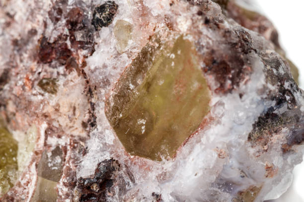 istock Macro mineral stoneGolden Apatite on a white background 1129389808