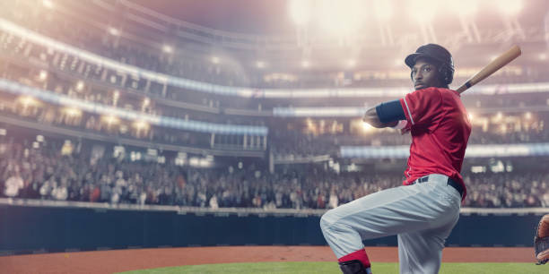 istock Baseball Batter Stands Ready For Ball During Arena Baseball Game 1129396501
