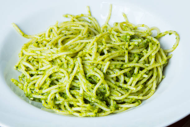 Italian Pasta Green Pesto Varied Italian Pasta comida italiana stock pictures, royalty-free photos & images