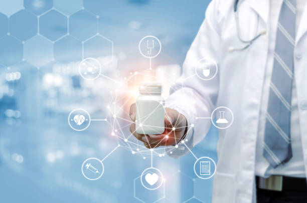 istock young pharmacist doctor with stethoscope hand holding white medicine bottle with data digital icon hologram in hospital background, health care pharmacy, medical innovation, future technology concept 1129398130