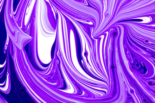 istock Abstract purple and white paint swirls 1129402411