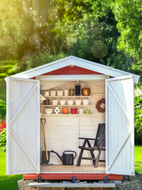 istock Garden shed filled with gardening tools. 1129403605