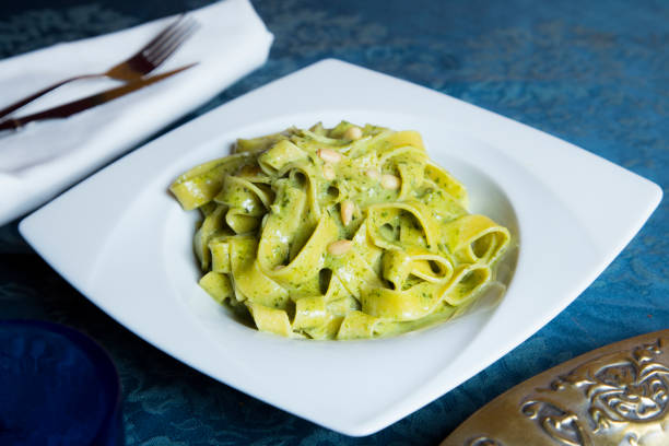 Italian Pasta Pesto Green Varied Italian Pasta comida italiana stock pictures, royalty-free photos & images