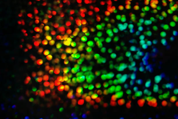 istock Abstract background.  Multicolored bokeh of small lights in blur. 1129406351