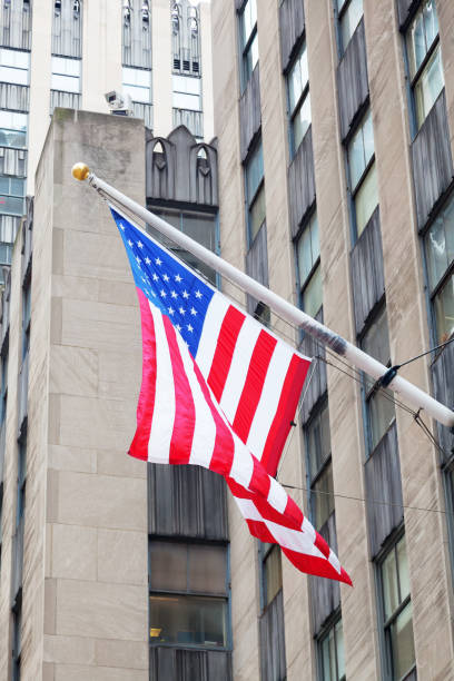 istock US flag at a building in NYC 1129407896