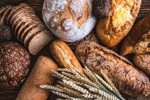 natura morta con pane e grano - pane foto e immagini stock