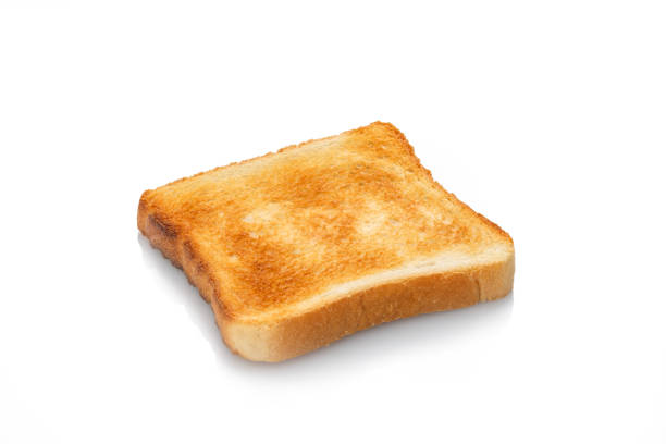 istock Toasted slice white toast bread white isolated 1129409560