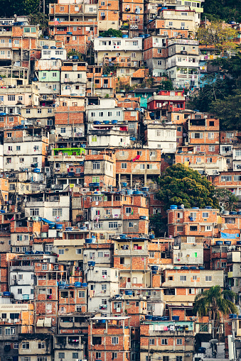 Favela shantytown on hill with densely packed informal housing.