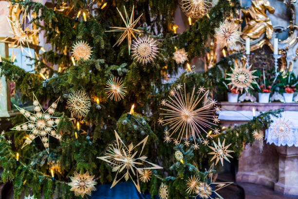 istock Straw stars on a Christmas tree 1129415016