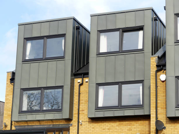 istock Modern terraced properties with brick and metal exteriors 1129416323