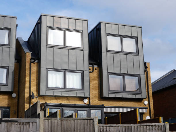 istock Modern terraced properties with brick and metal exteriors 1129416332