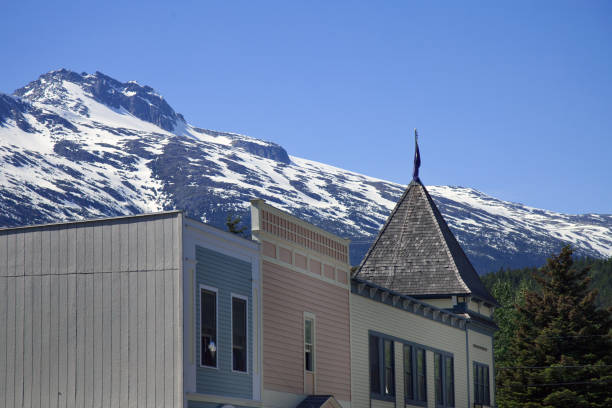istock Historic Skagway, Alaska is surrounded by snow capped Mountains 1129417524