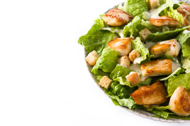 istock Caesar salad with lettuce,chicken and croutons 1129419498