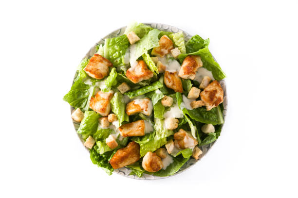 istock Caesar salad with lettuce,chicken and croutons 1129419686