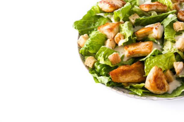 istock Caesar salad with lettuce,chicken and croutons 1129419750
