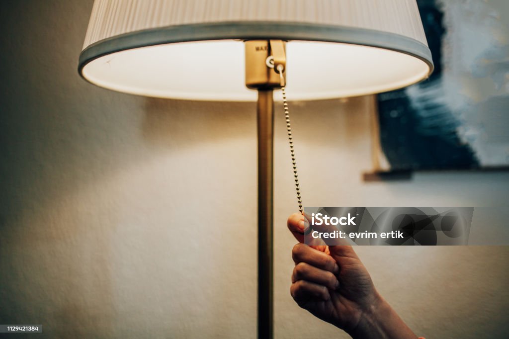 Turning off a lamp Turning On Or Off Stock Photo