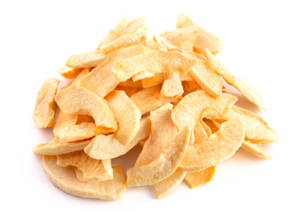 Slices of Dried Apple on a White Background stock photo