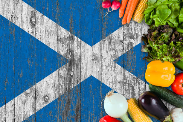 legumes frescos da escócia na tabela. cozinhar o conceito sobre fundo de bandeira de madeira. - scottish cuisine - fotografias e filmes do acervo