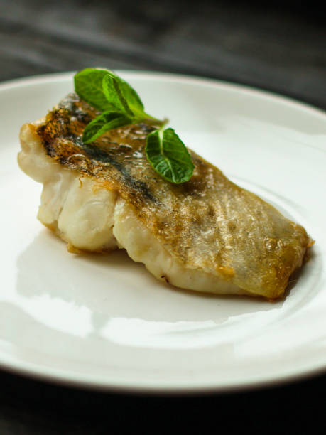 istock Fish, fried seafood (white fish on the plate). Food background 1129431332