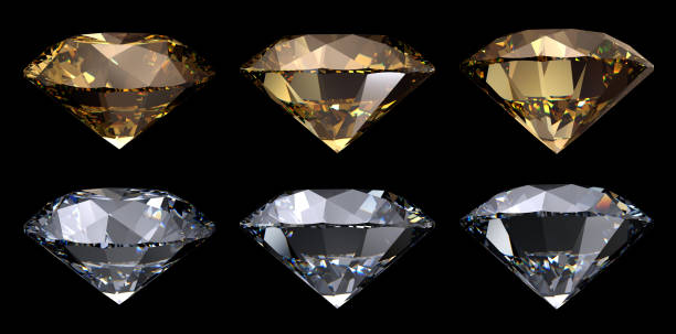 istock Golden yellow, clear round cut diamonds isolated on black background 1129432079