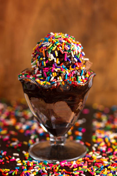 istock A Chocolate Ice Cream Sundae with Chocolate Syrup and Rainbow Sprinkles 1129438876