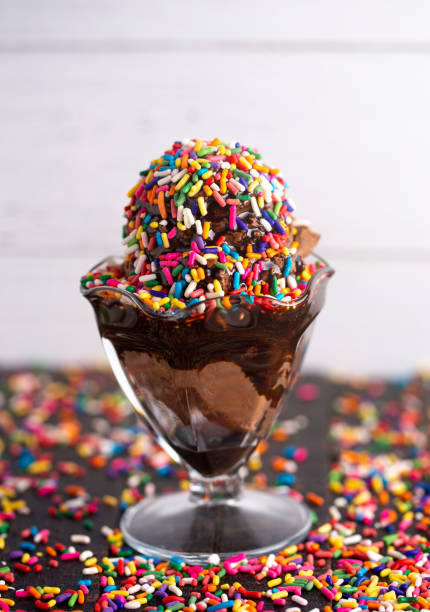istock A Chocolate Ice Cream Sundae with Chocolate Syrup and Rainbow Sprinkles 1129438931